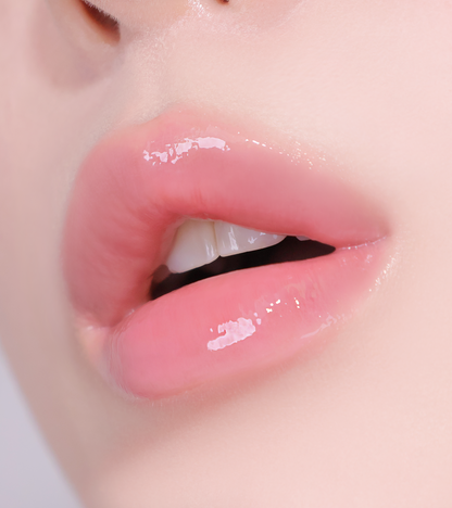 Swirl of HUEMI Melting Glaze Lip Gloss 01 Rosy Nude texture
